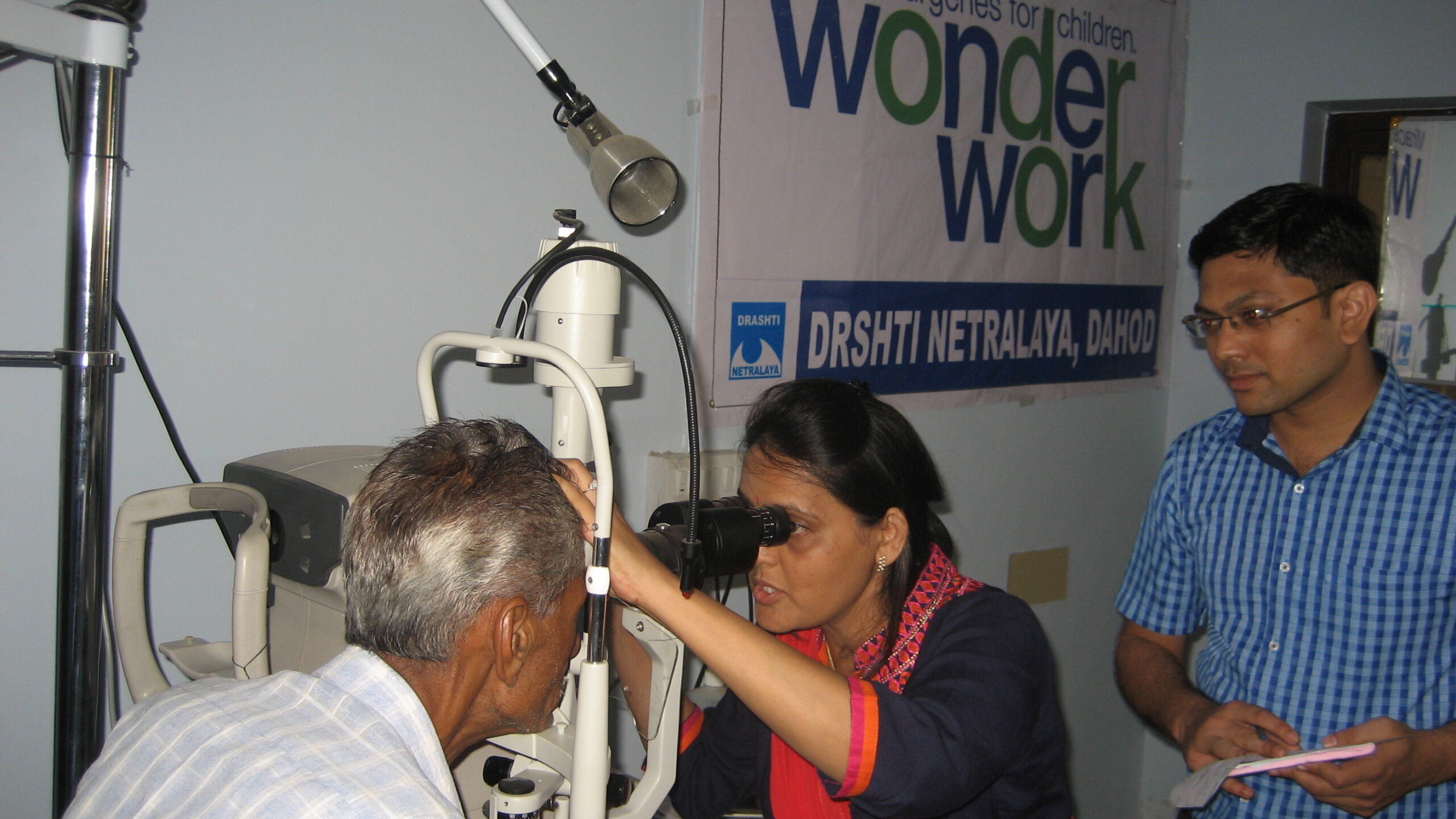 An eye examination at Nirant Eye Care Center, Godhra